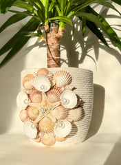 Indoor plant pot with shells