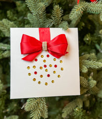 Elegant Handmade Christmas Card with Red Bow and Gem Ornament Design
