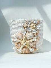 Indoor plant pot with shells
