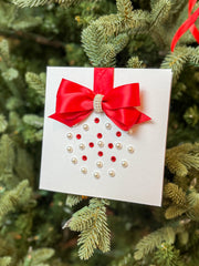 Elegant Handmade Christmas Card with Red Bow and Gem Ornament Design