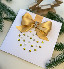 Elegant Handmade Christmas Card with Gold Bow and Gem Ornament Design