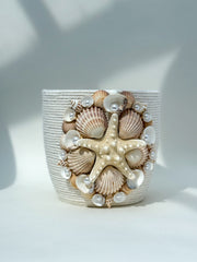 Indoor plant pot with shells