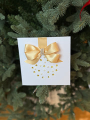 Elegant Handmade Christmas Card with Gold Bow and Gem Ornament Design