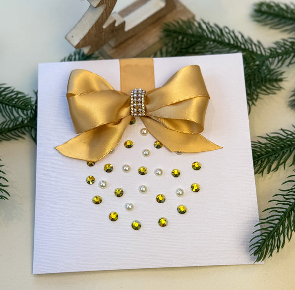 Elegant Handmade Christmas Card with Gold Bow and Gem Ornament Design