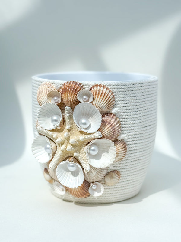 Indoor plant pot with shells