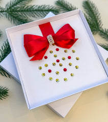Elegant Handmade Christmas Card with Red Bow and Gem Ornament Design