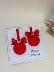 Elegant Handmade Christmas Card with Red Bow and Gem Ornament Design