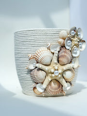 Indoor plant pot with shells