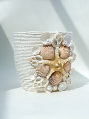 Indoor plant pot with shells