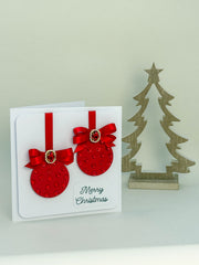 Elegant Handmade Christmas Card with Red Bow and Gem Ornament Design