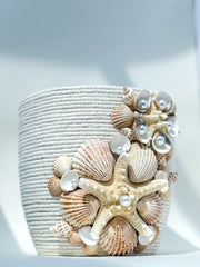 Indoor plant pot with shells