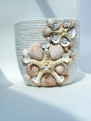 Indoor plant pot with shells