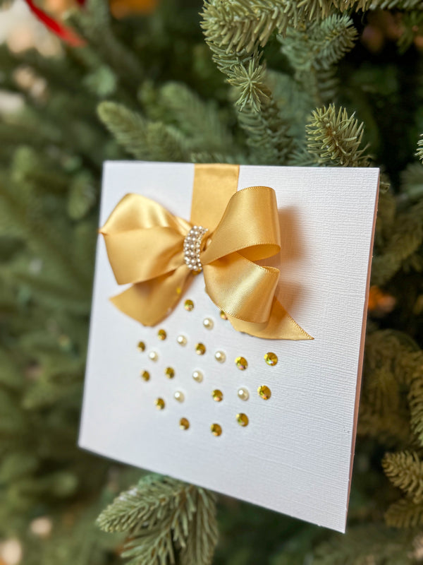 Elegant Handmade Christmas Card with Gold Bow and Gem Ornament Design