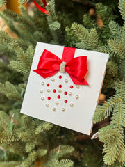 Elegant Handmade Christmas Card with Red Bow and Gem Ornament Design