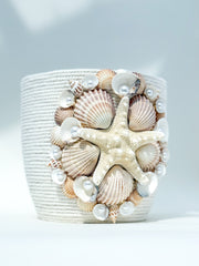 Indoor plant pot with shells