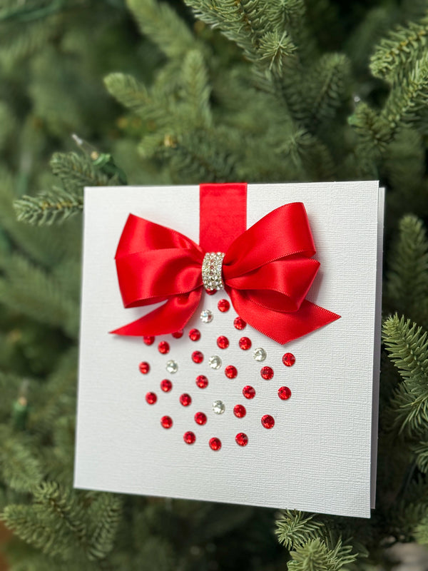 Elegant Handmade Christmas Card with Red Bow and Gem Ornament Design