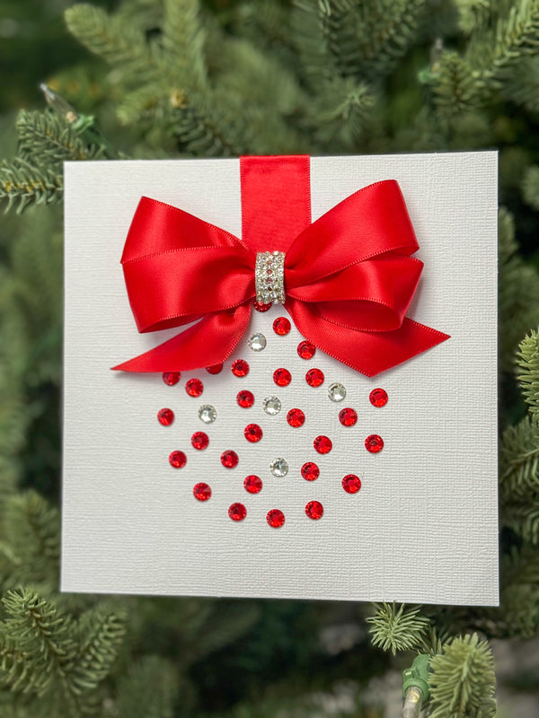 Elegant Handmade Christmas Card with Red Bow and Gem Ornament Design