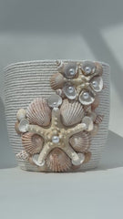 Indoor plant pot with shells