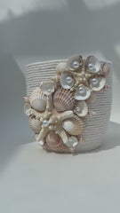 Indoor plant pot with shells