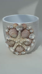 Indoor plant pot with shells